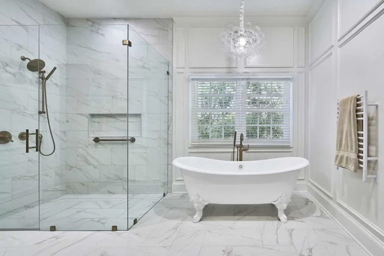 Curbless Shower that is sleek, safer, easier to clean, and opens up the visual space of a bathroom
